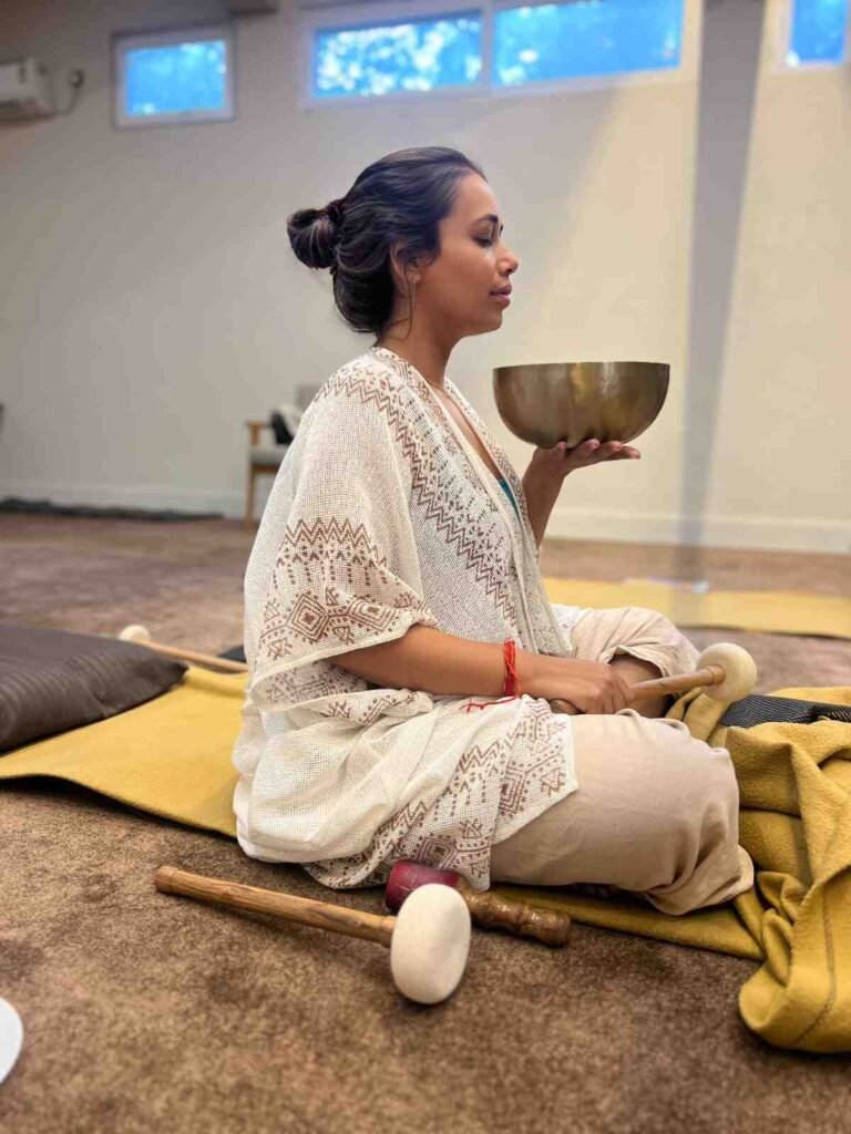 Singing bowl meditation during a sound healing session